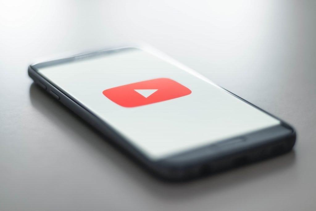 Smartphone with YouTube logo on the screen 