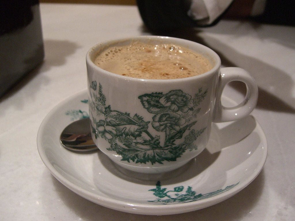 Cup of Ipoh white coffee served on a vintage cup