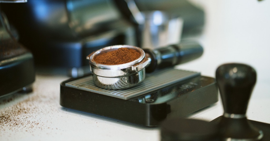 The difference between coffee grounds and espresso grounds is that the latter are finer.