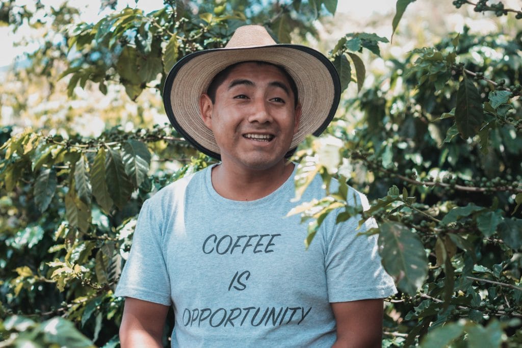 Man wearing a t-shirt in a coffee farm