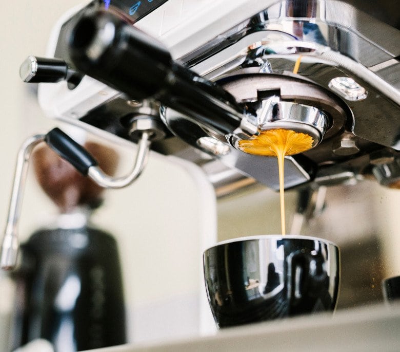 Brewing espresso with a naked portafilter Espresso machine